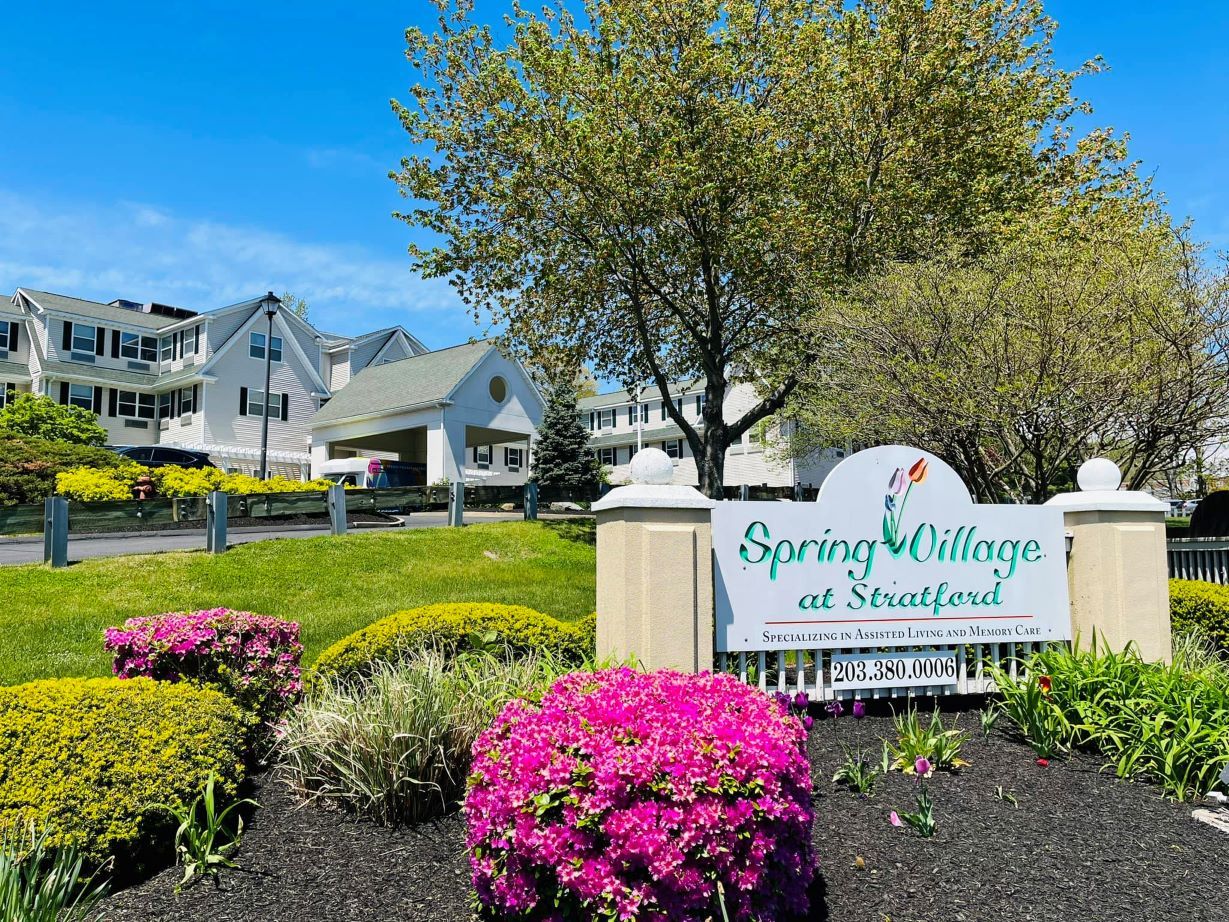Exterior view of Spring Village at Stratford with landscaping