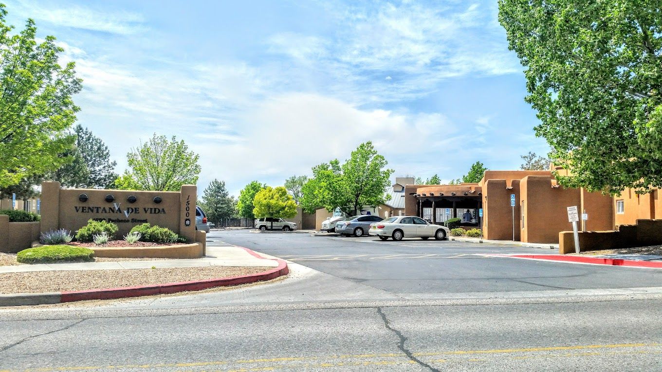 Exterior view of Ventana De Vida with trees and parking