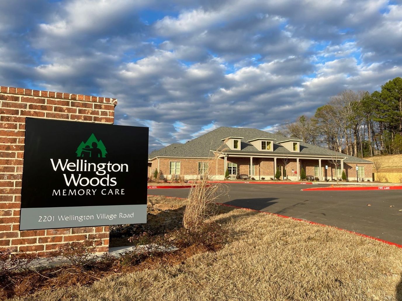 Exterior view of Wellington Woods Memory Care building