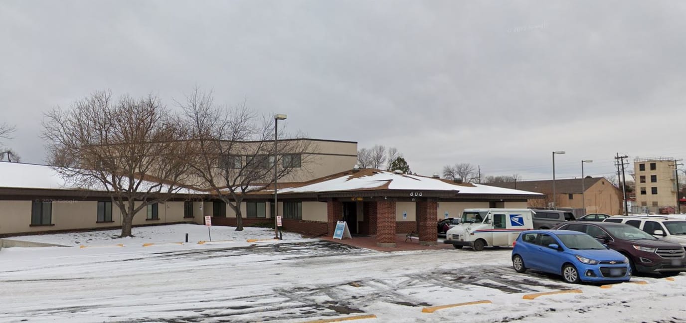 Exterior view of a senior living facility in winter