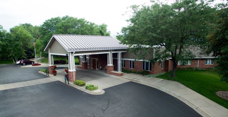 Exterior view of Columbine West Health and Rehab Facility entrance