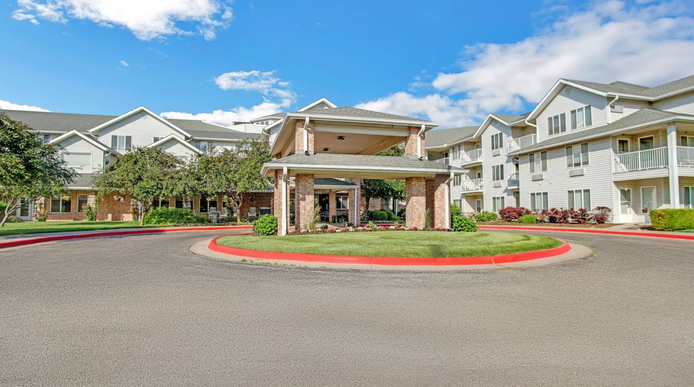 Entrance of Holiday Grasslands Estates with landscaping