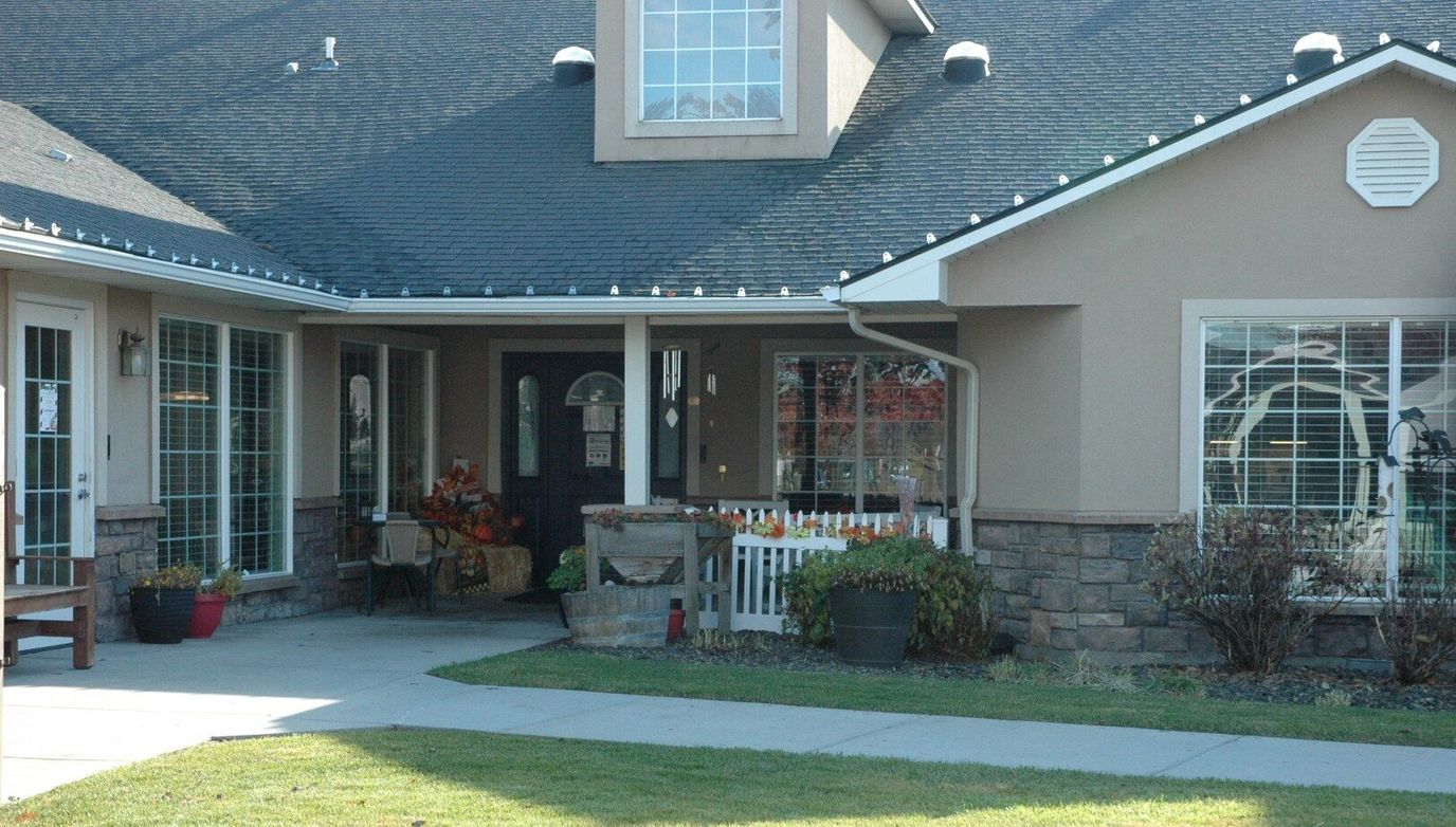 Exterior view of the facility entrance with landscaping