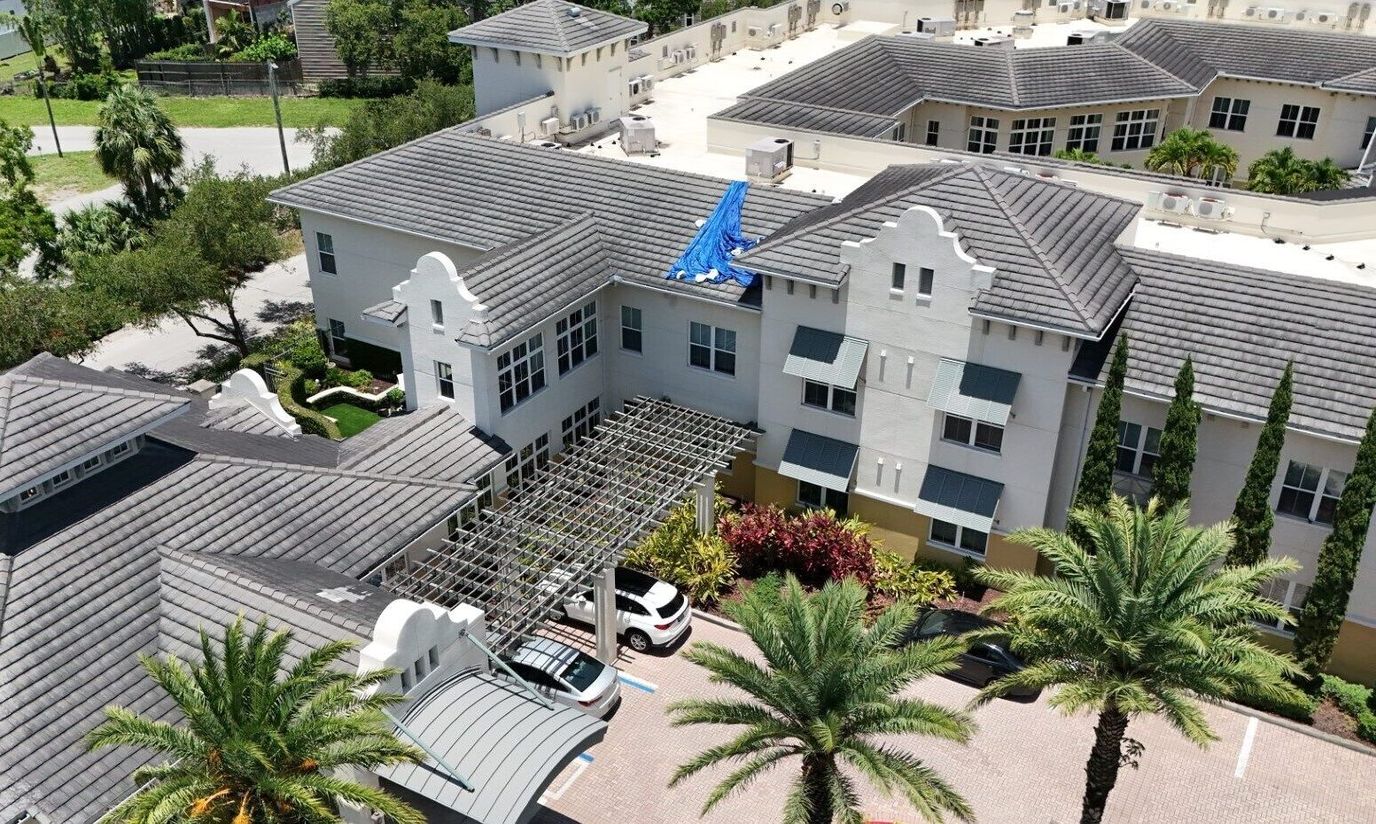 Aerial view of the facility's exterior with landscaping