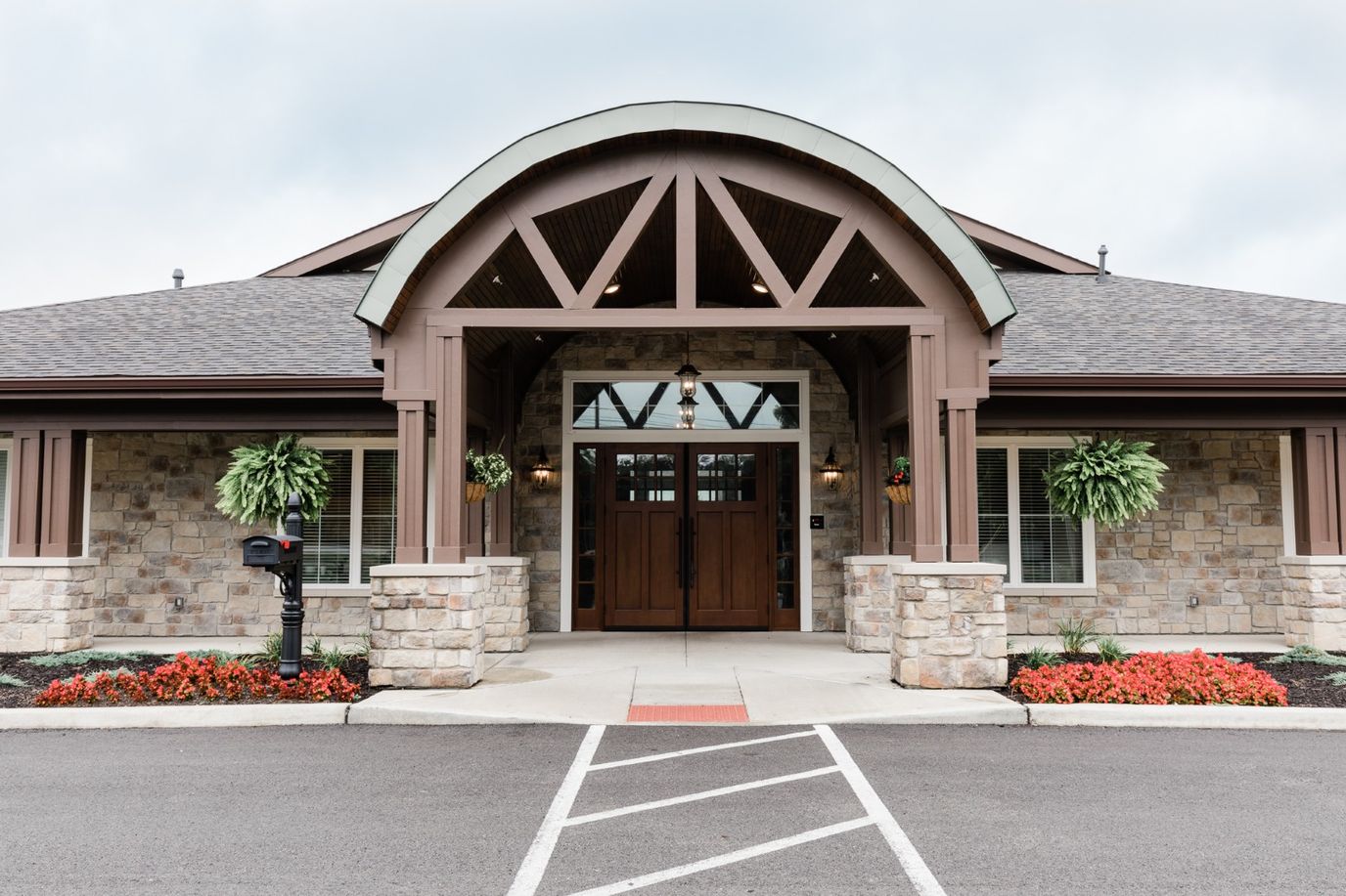 Exterior view of the facility entrance with landscaping