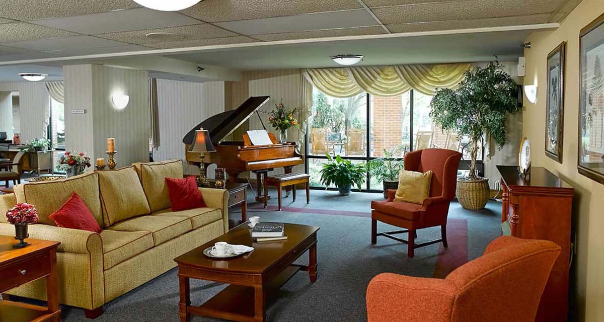Cozy interior lounge with piano and seating