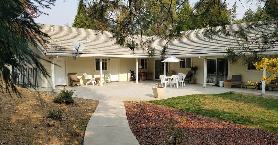 Outdoor patio area with seating at the facility