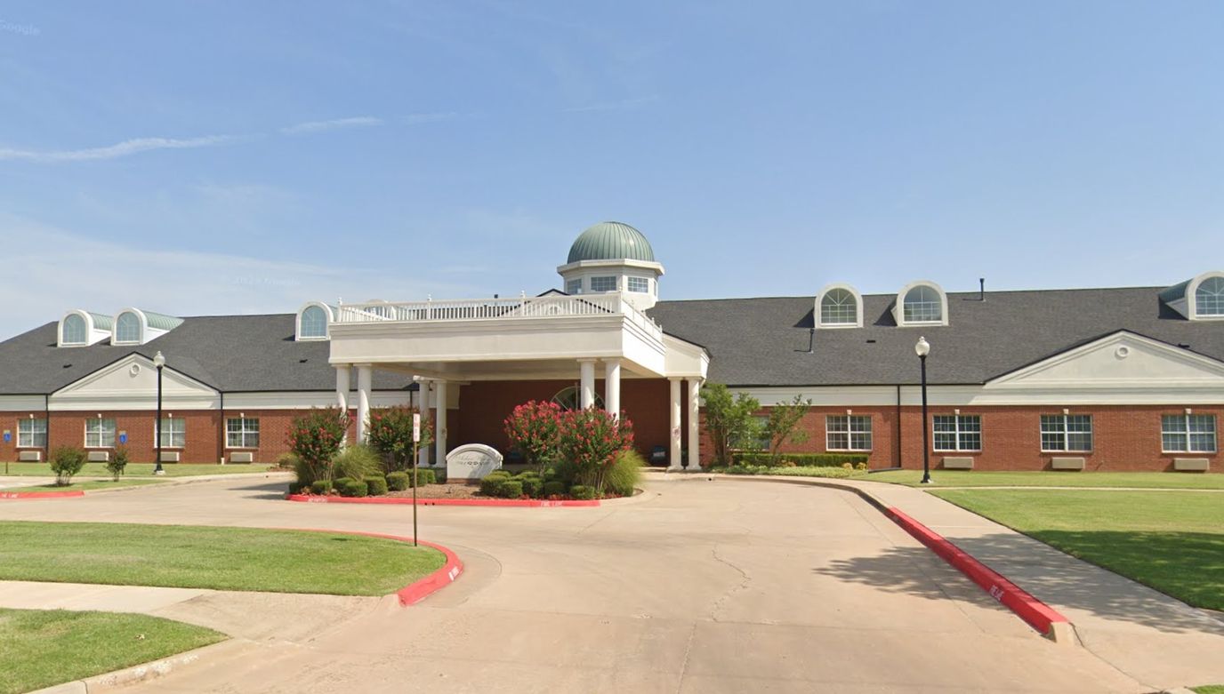 Exterior view of Arbor House building with landscaping