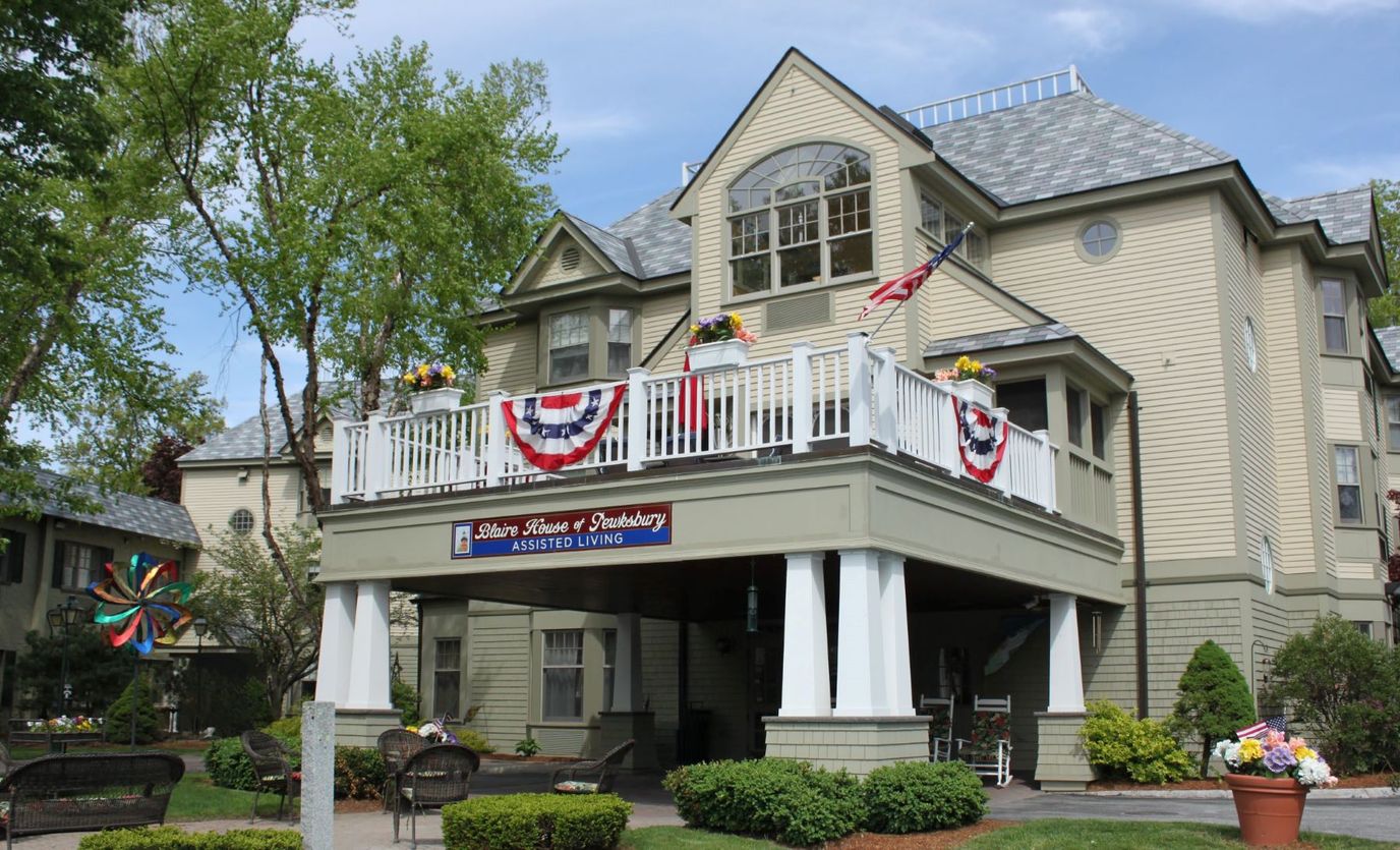 Exterior view of assisted living facility with decorations