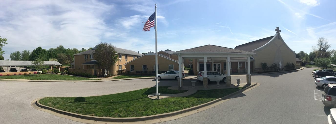 Exterior view of Carmel Home with landscaped area