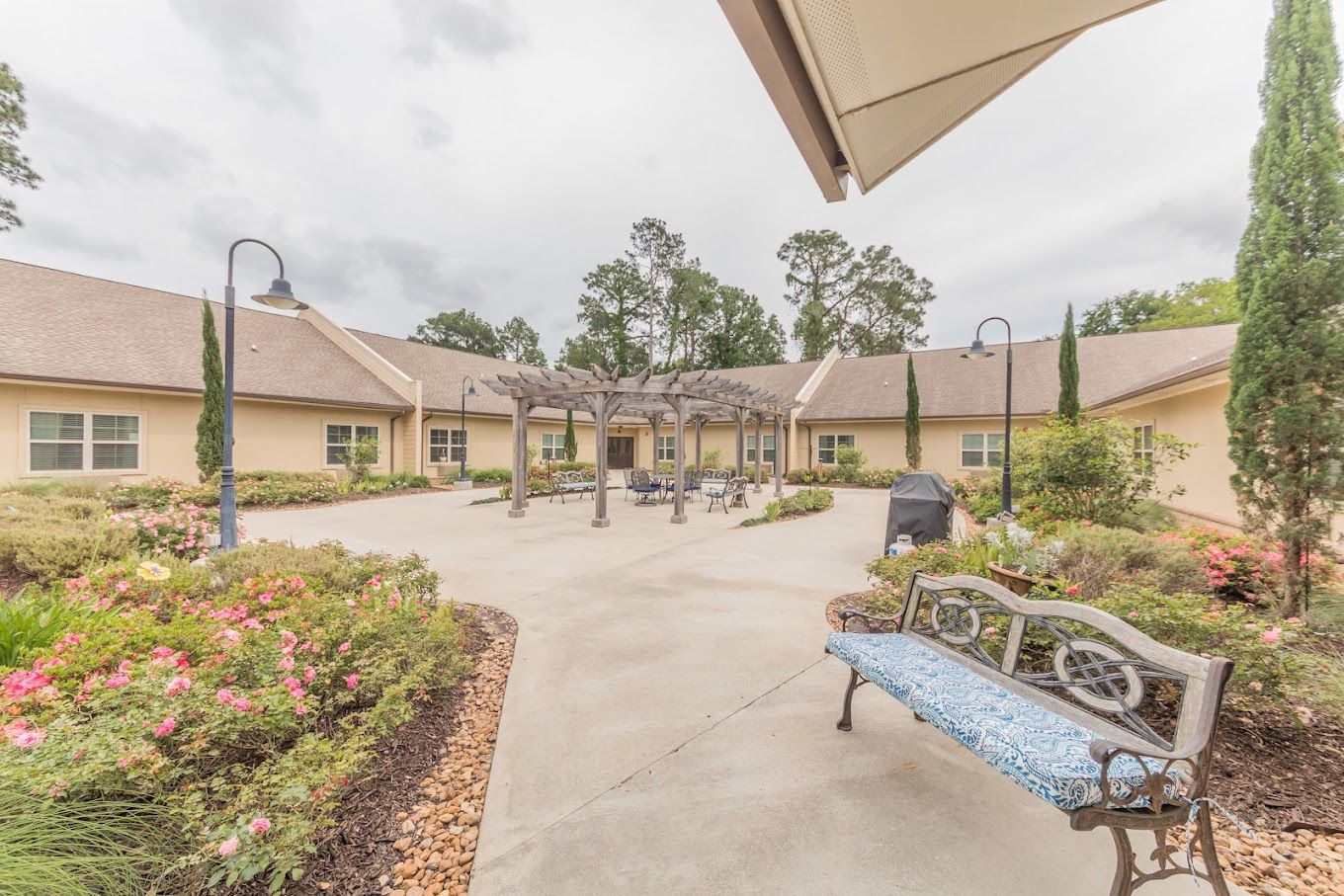 Garden area with benches and landscaped pathways