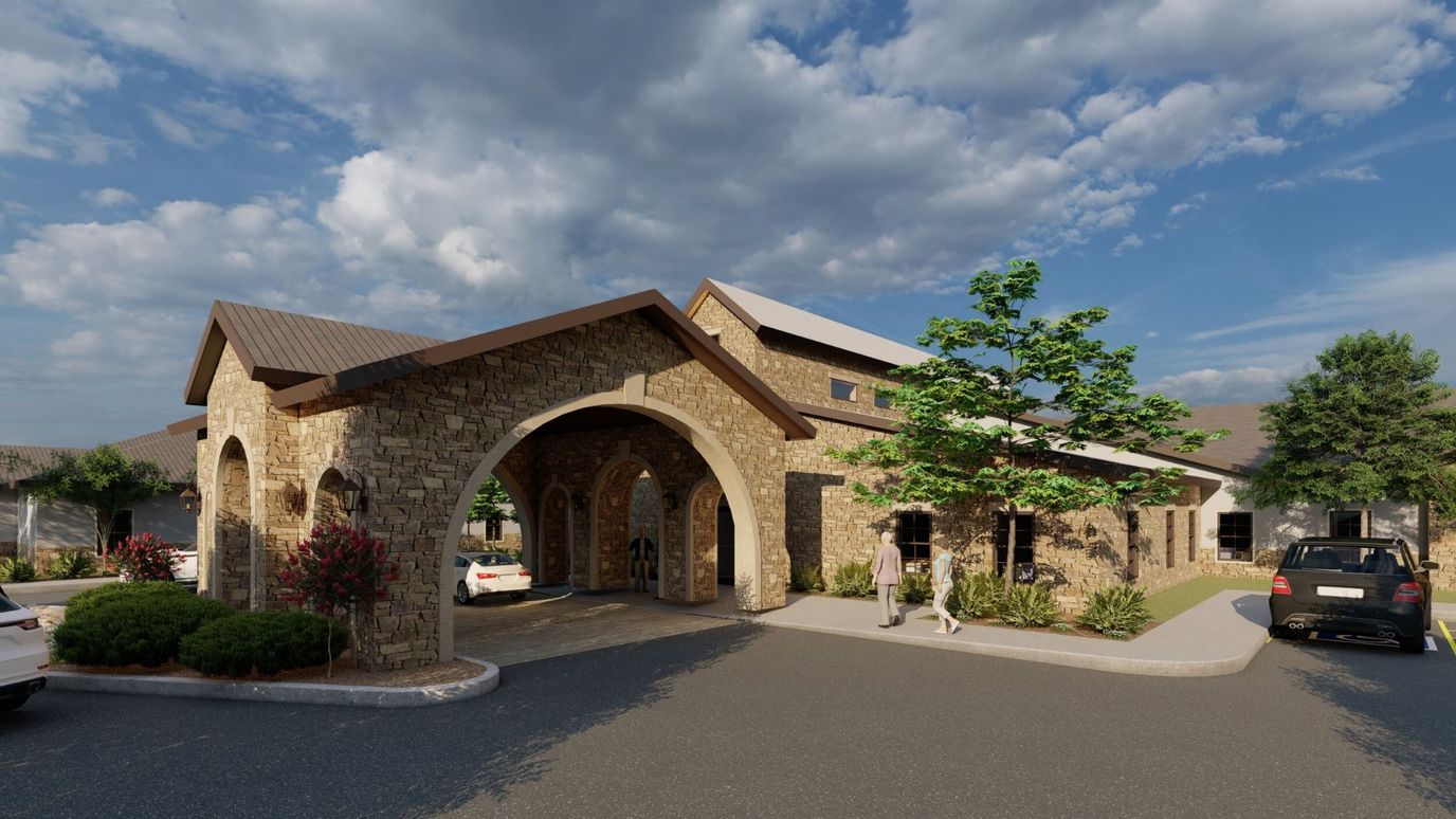 Exterior view of Crestview Senior Living entrance with landscaping