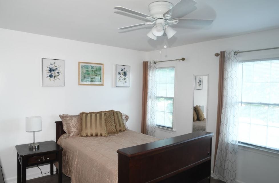 Cozy bedroom with a bed and decorative wall art