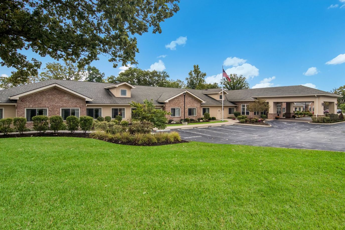 Exterior view of Greenfield Estates with landscaped grounds