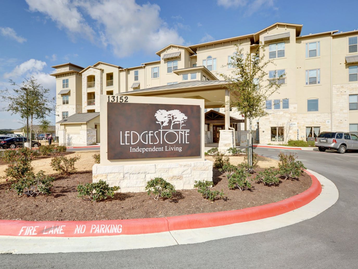 Entrance of Ledgestone Independent Living facility with signage