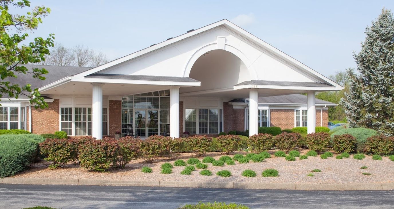 Exterior view of Magnolia Village facility entrance