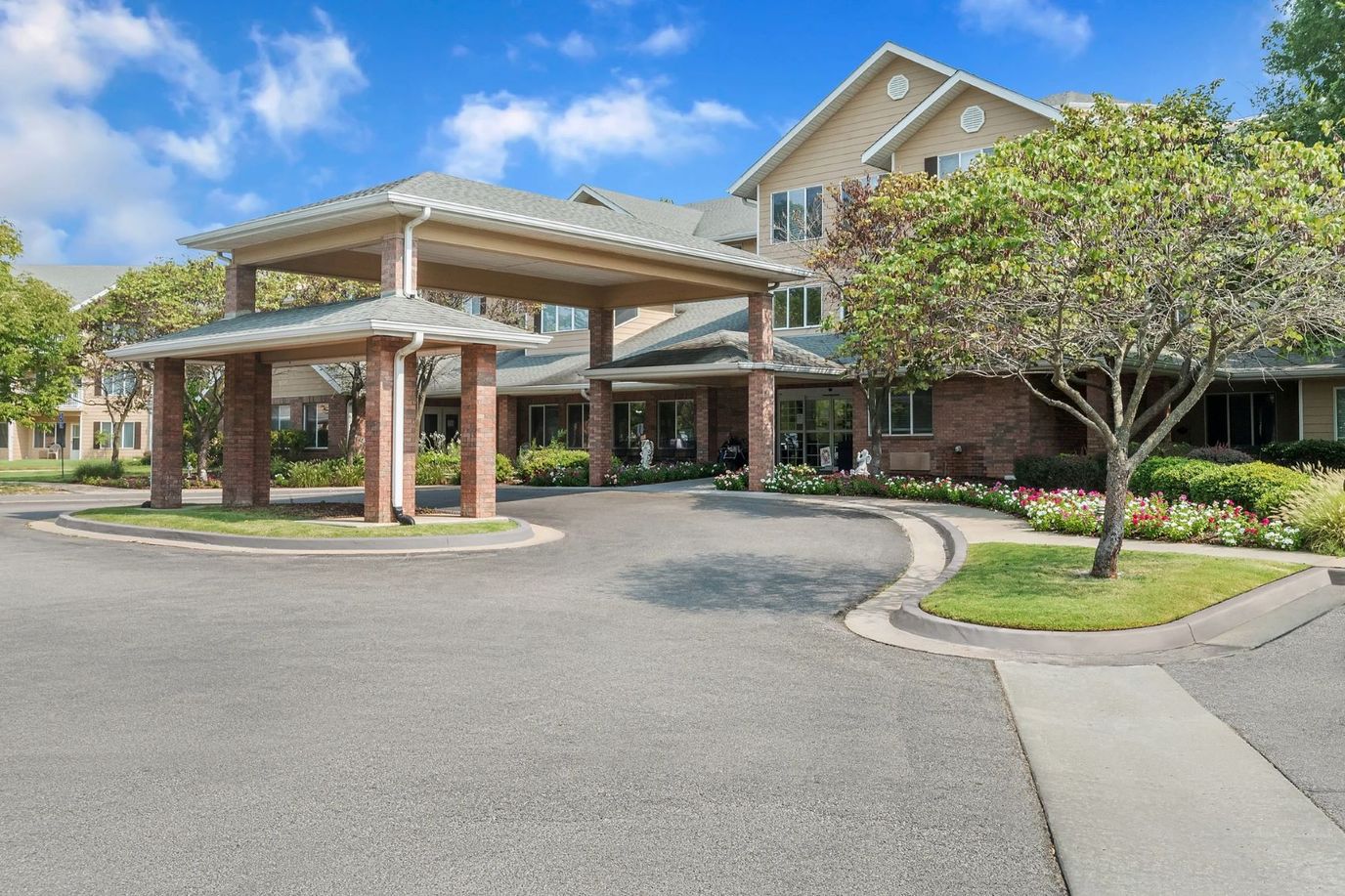 Entrance of Morada Broken Arrow with landscaping.