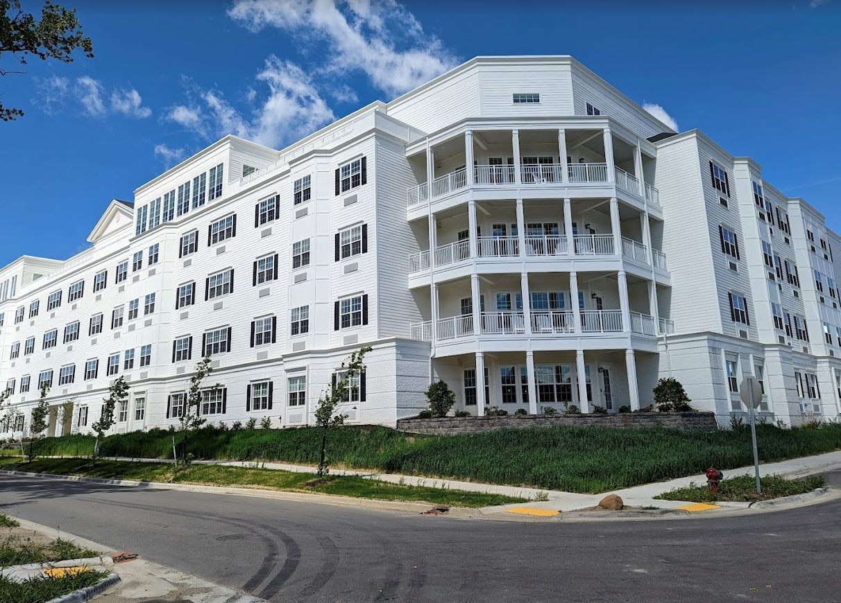 Exterior view of Red Cedar Lodge building showing balconies