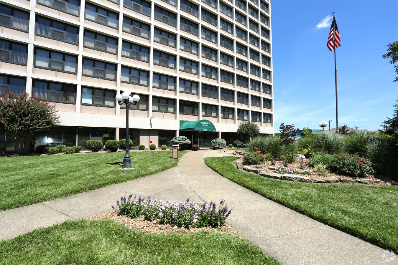 Exterior view of Roosevelt House with gardens and entrance