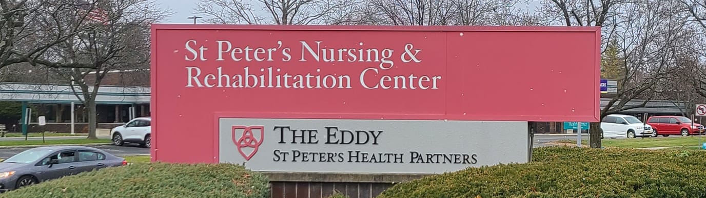 Sign displaying the facility's name and identity