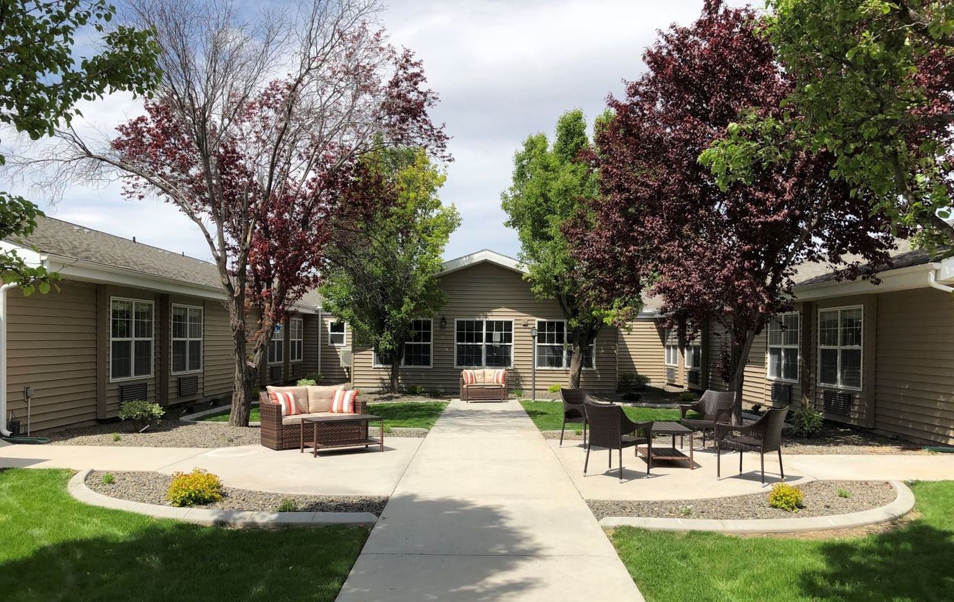 Outdoor courtyard with seating and trees