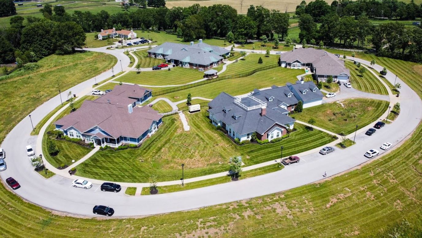 Aerial view of a senior living campus with multiple buildings