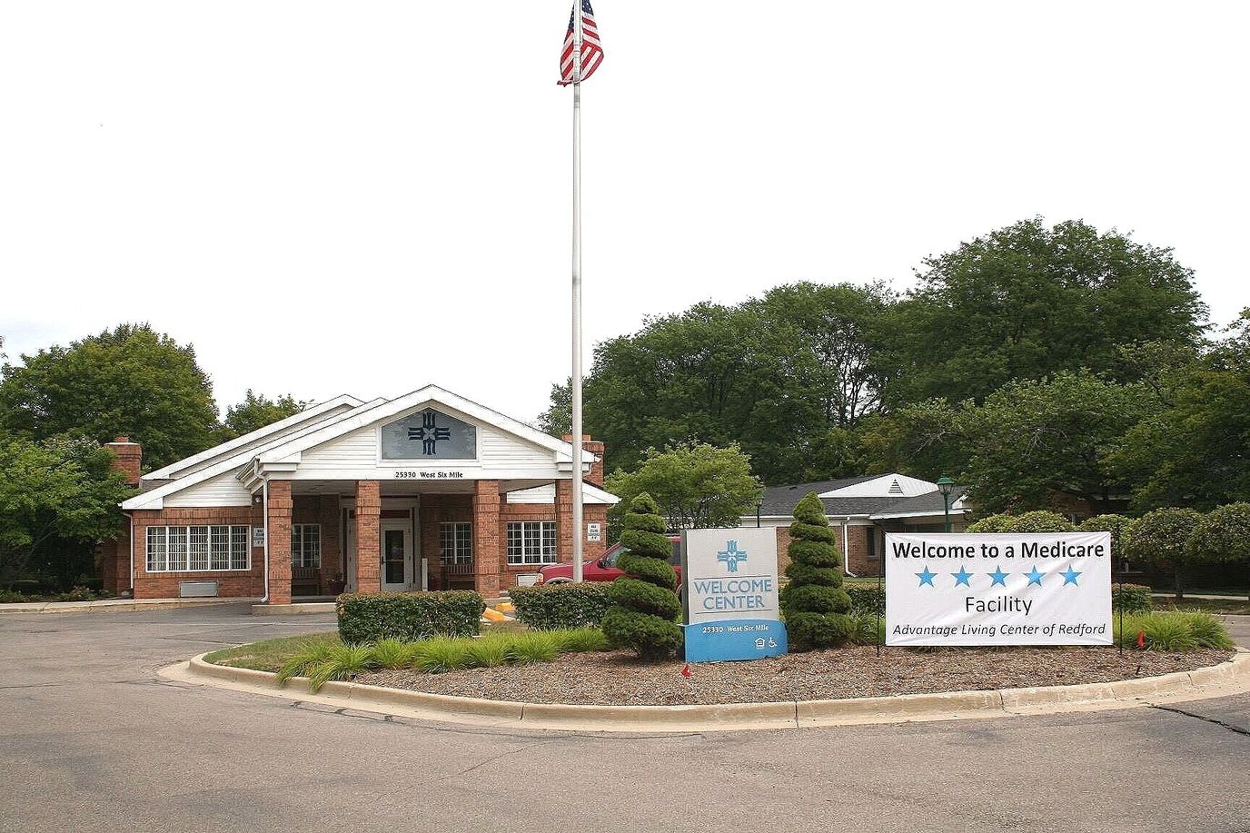 Exterior view of a senior care facility entrance.