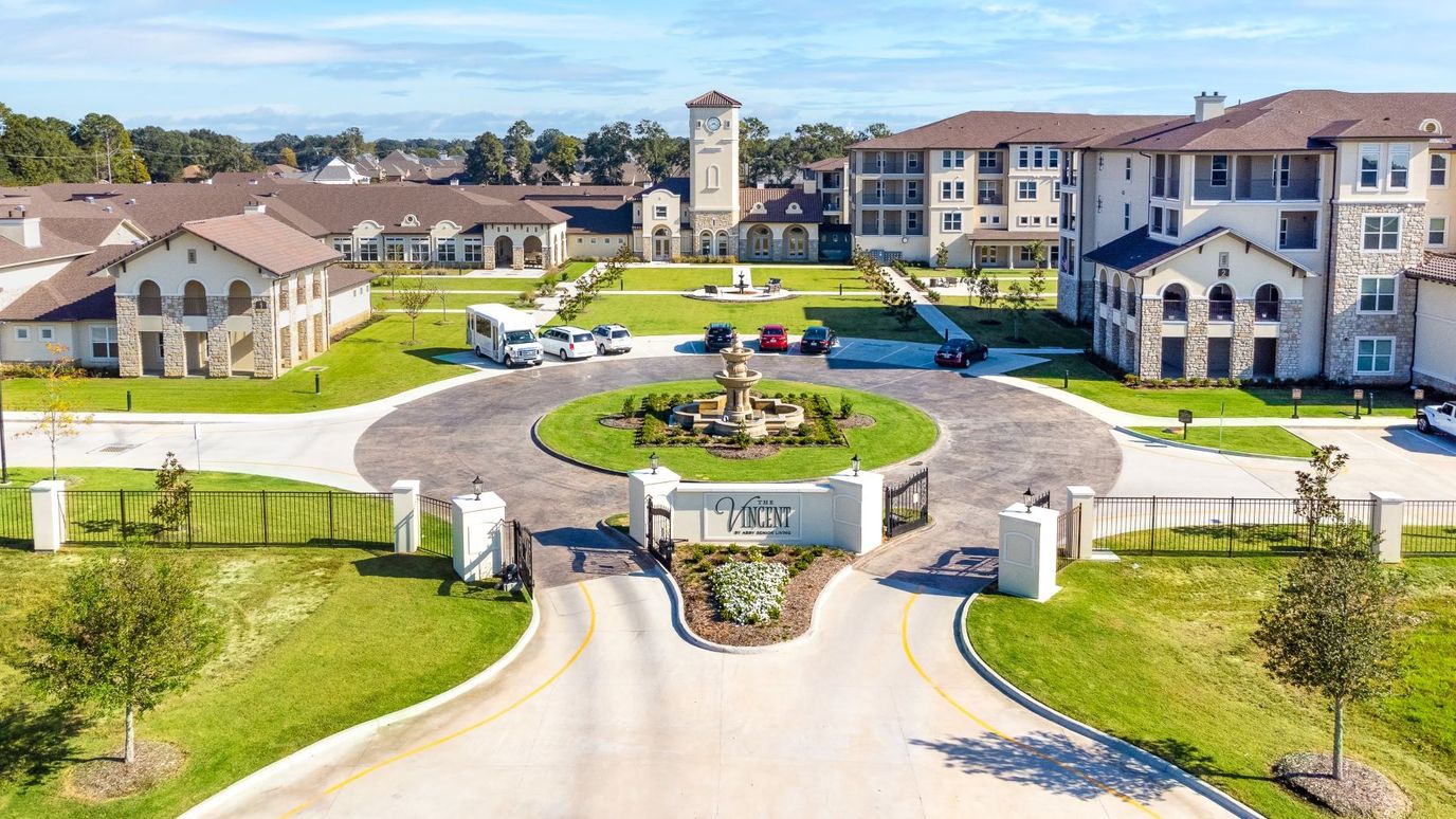 Aerial view of The Vincent senior living facility with landscaped grounds