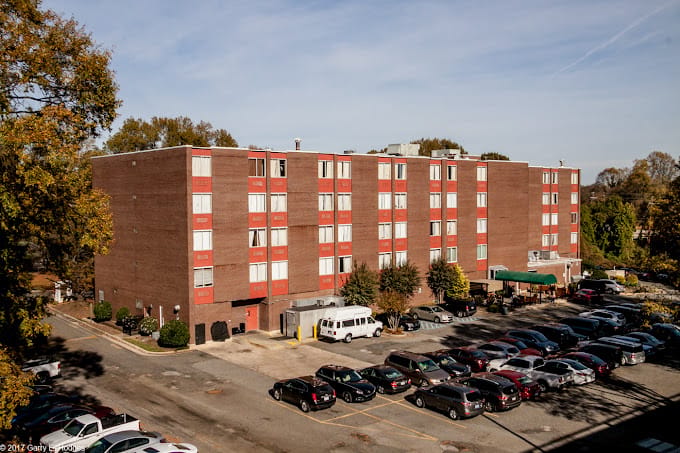 Exterior view of Willow Valley Center with parked cars