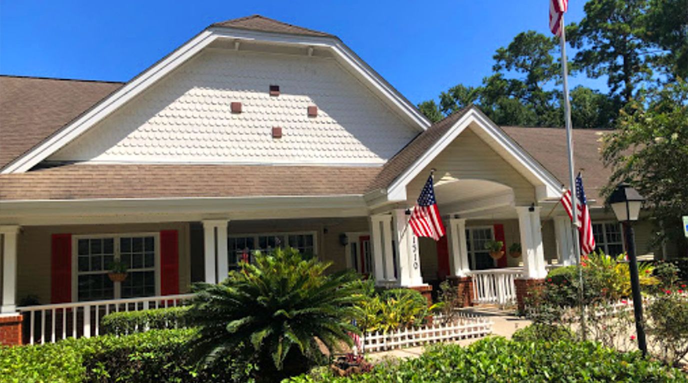 Exterior view of Sunabella at Savannah with flags