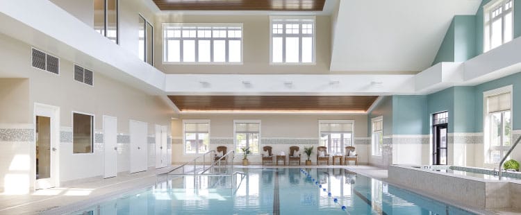 Indoor swimming pool area with natural light