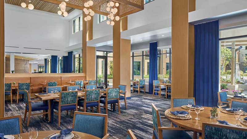 Elegant dining area with well-set tables and decor