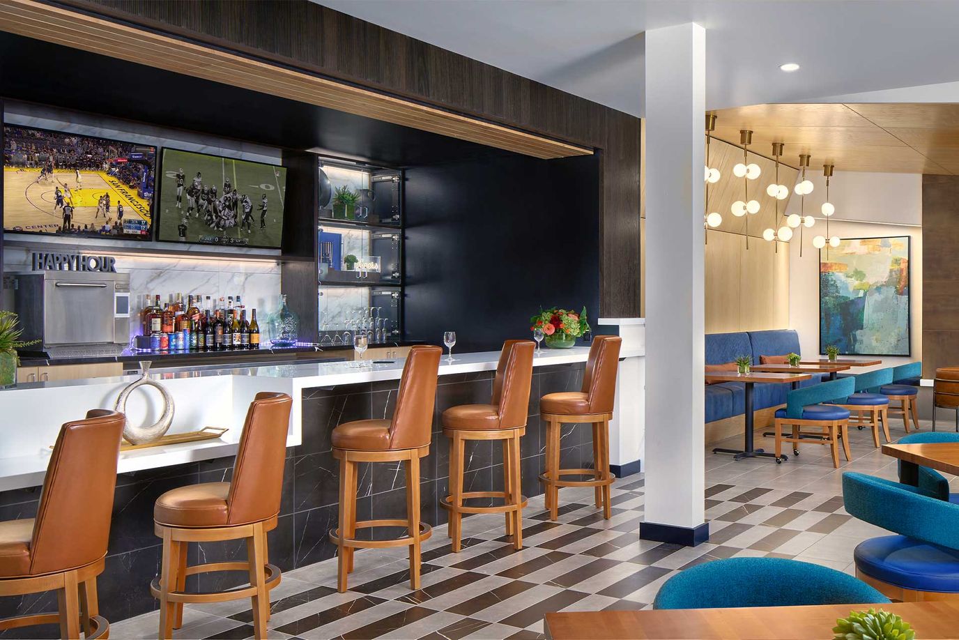 Interior view of a stylish bar area with seating