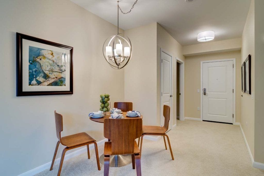 Cozy dining area in a resident's room with decor