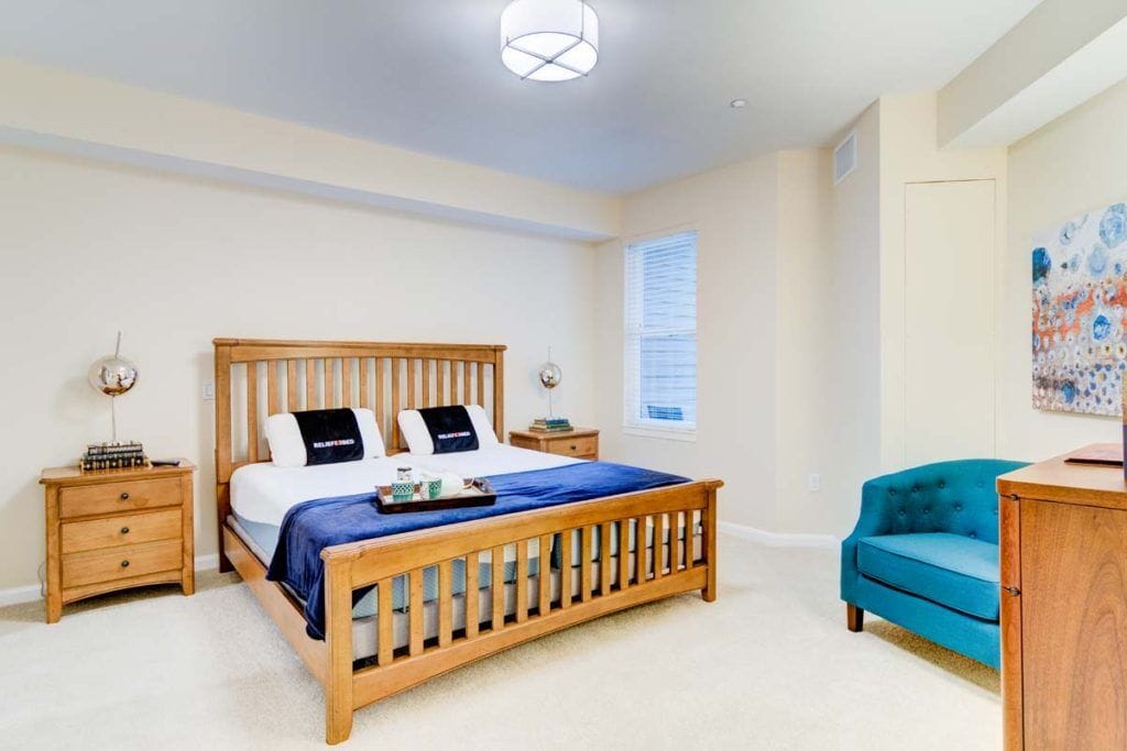 Bright, well-furnished resident room with a cozy atmosphere