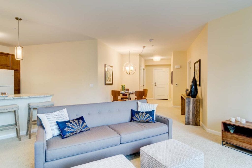 Well-furnished lounge area with soft lighting