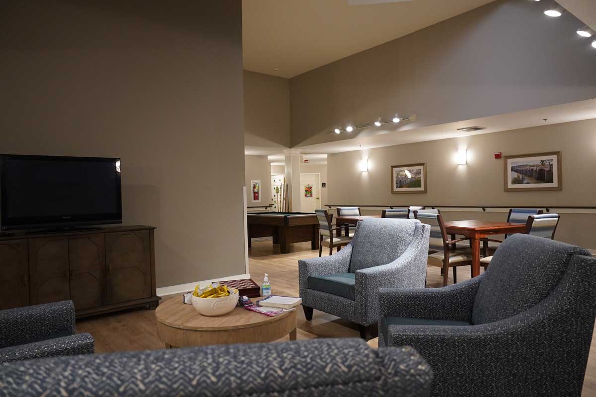 Cozy common area with seating and dining tables