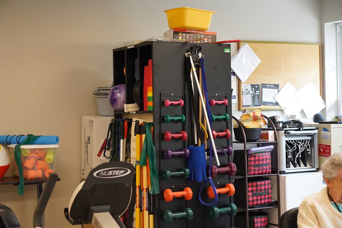 Activity room with exercise equipment and weights