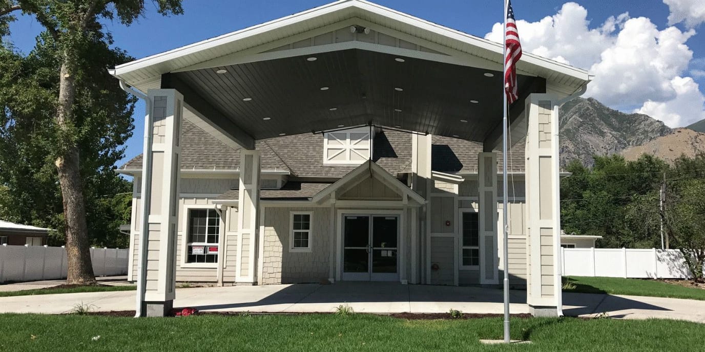 Exterior view of the facility building with entrance