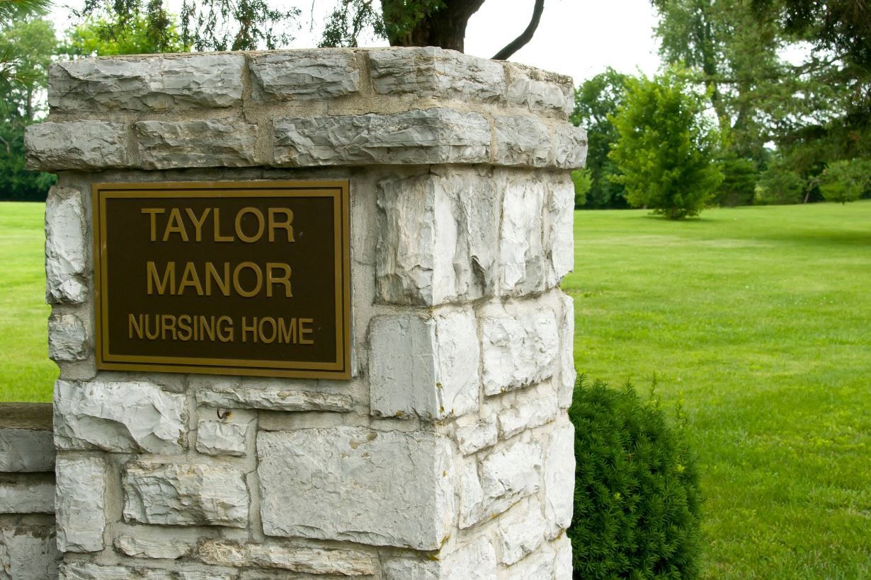 Entrance sign for Taylor Manor Nursing Home