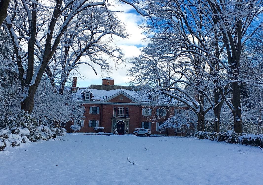 Exterior view of The Villa St. Elizabeth covered in snow