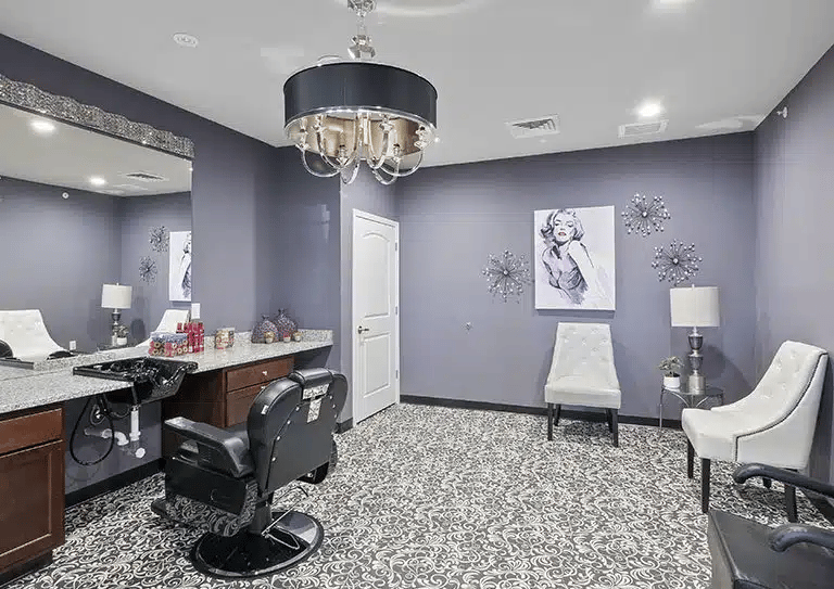 Stylish salon interior with hair styling station and artwork