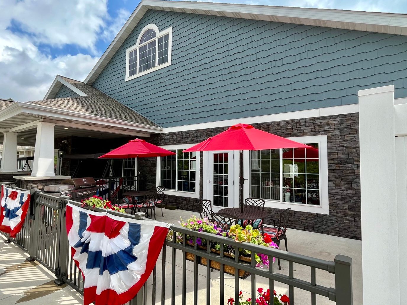 Exterior view of the facility with outdoor seating