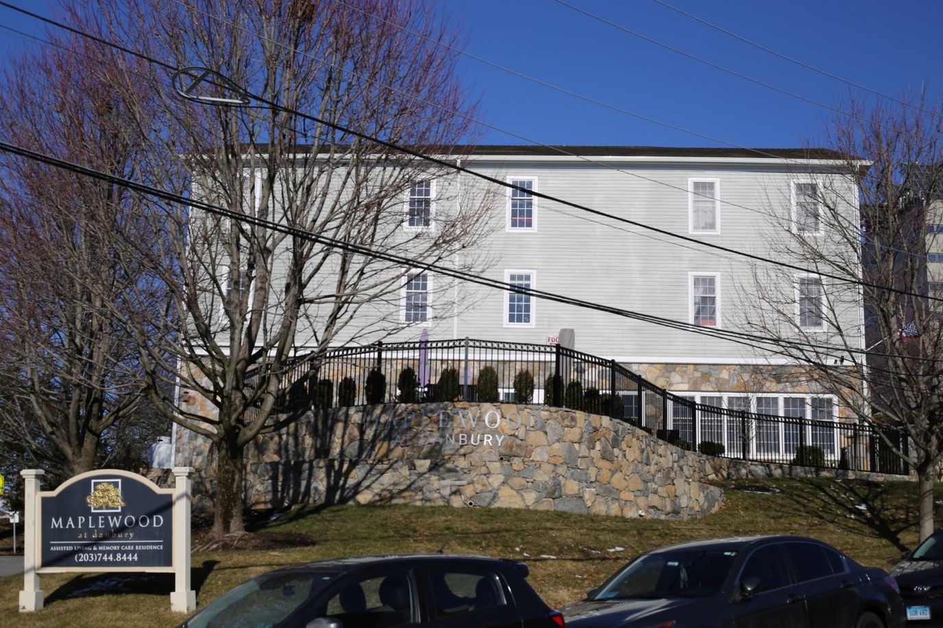 Exterior view of Maplewood at Danbury with signage