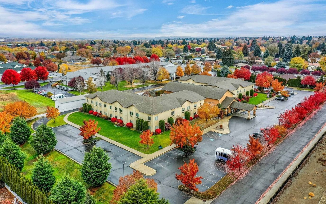 Aerial view of Ellensburg Senior Living with colorful fall foliage