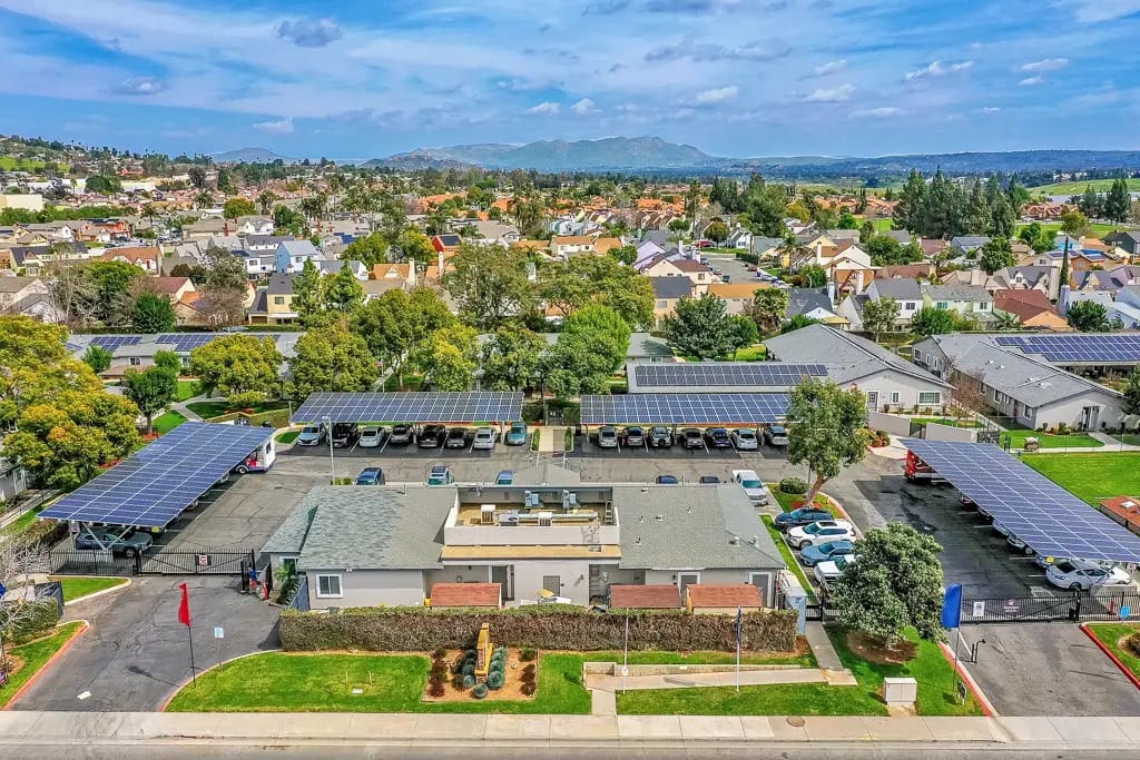 Aerial view of Cottages at Riverside with solar panels