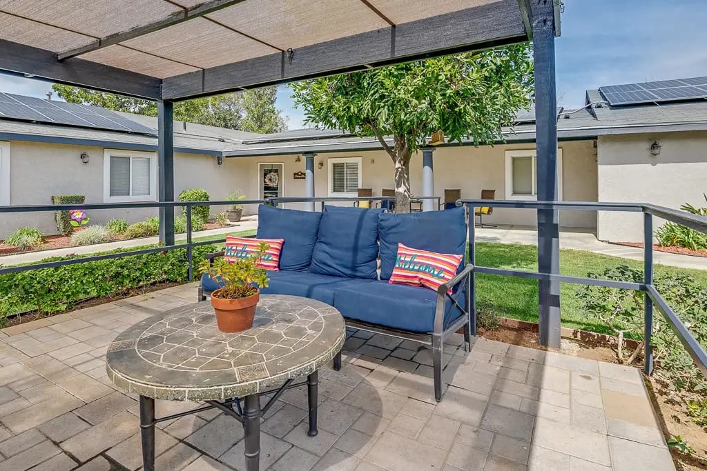 Outdoor seating area with garden view