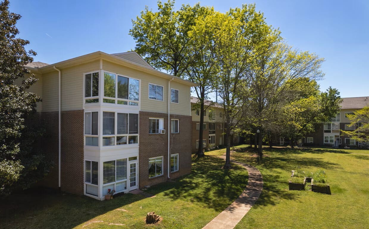 Building exterior with surrounding green space