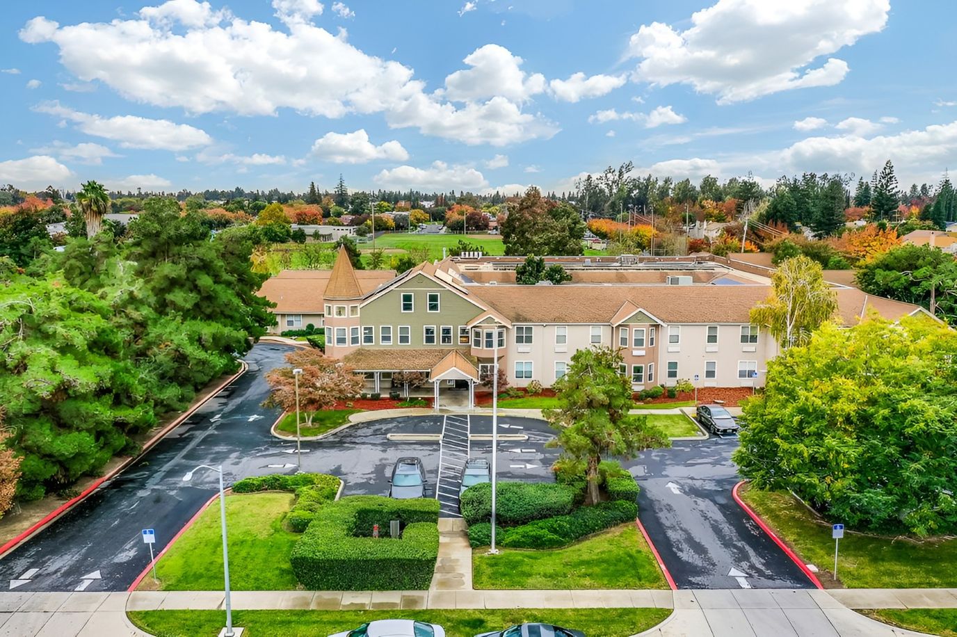 Aerial view of Merced Senior Living facility with landscaped grounds