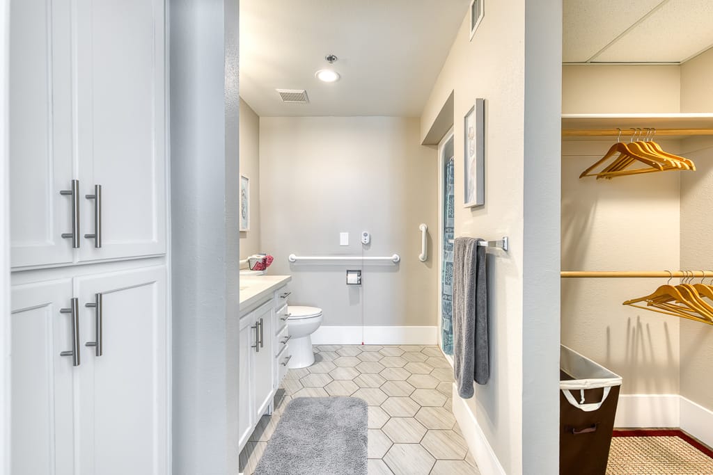 Modern bathroom with safety features and closet space